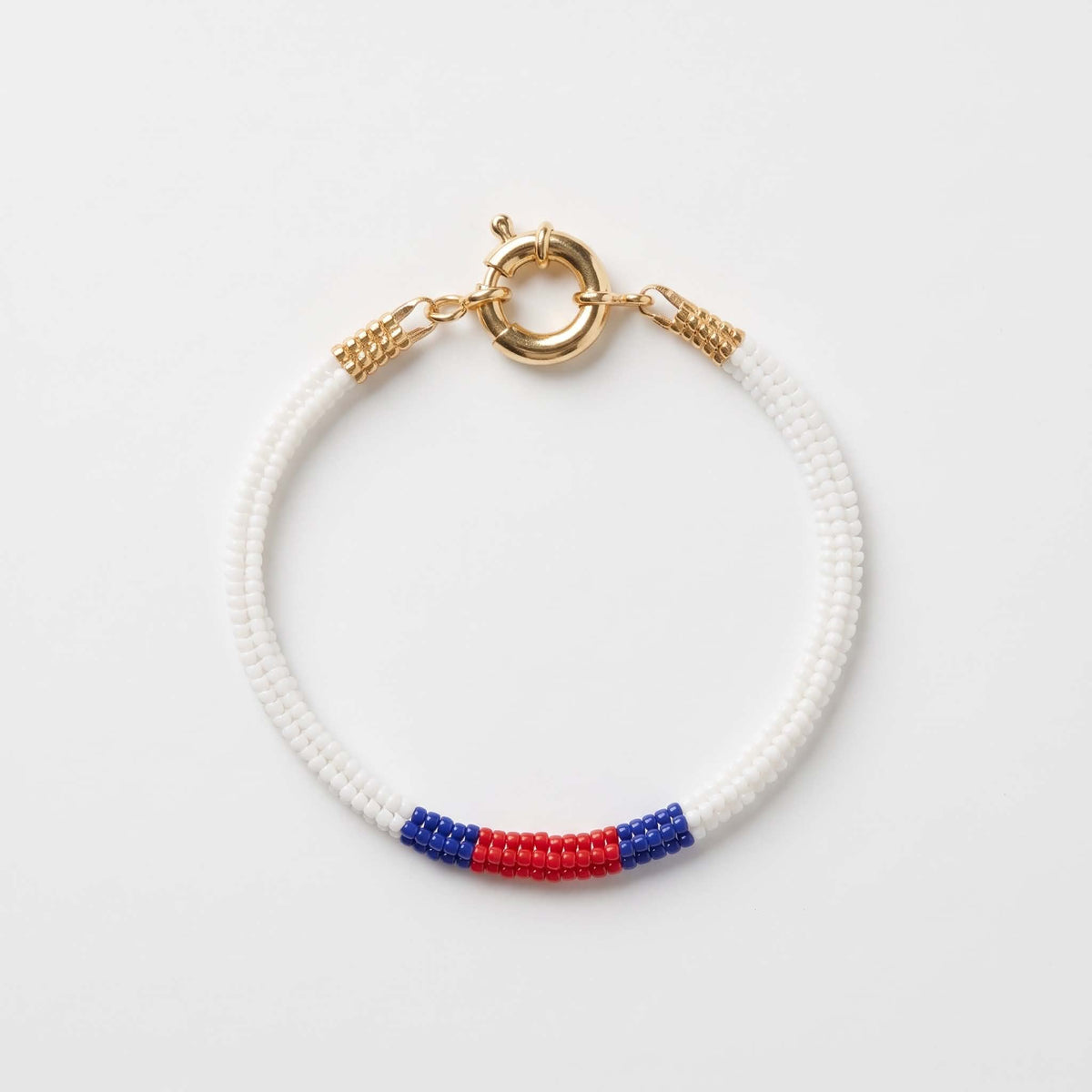 Armband - hvítt/reytt/blátt - gull stødd XS/S